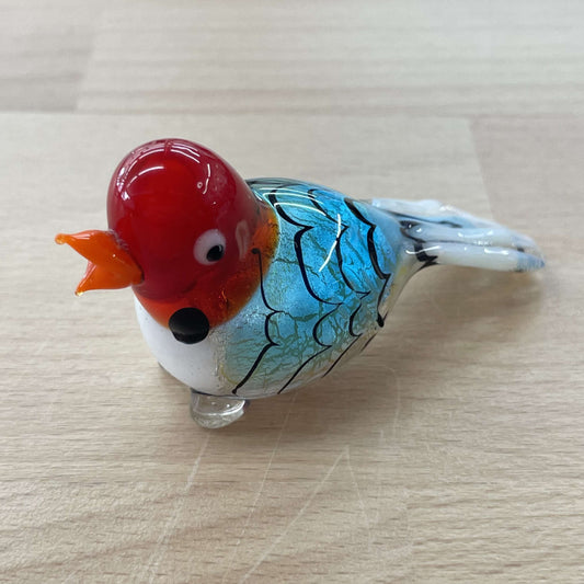 Vintage Murano foil glass bird figurine with a red head and turquoise scaled body