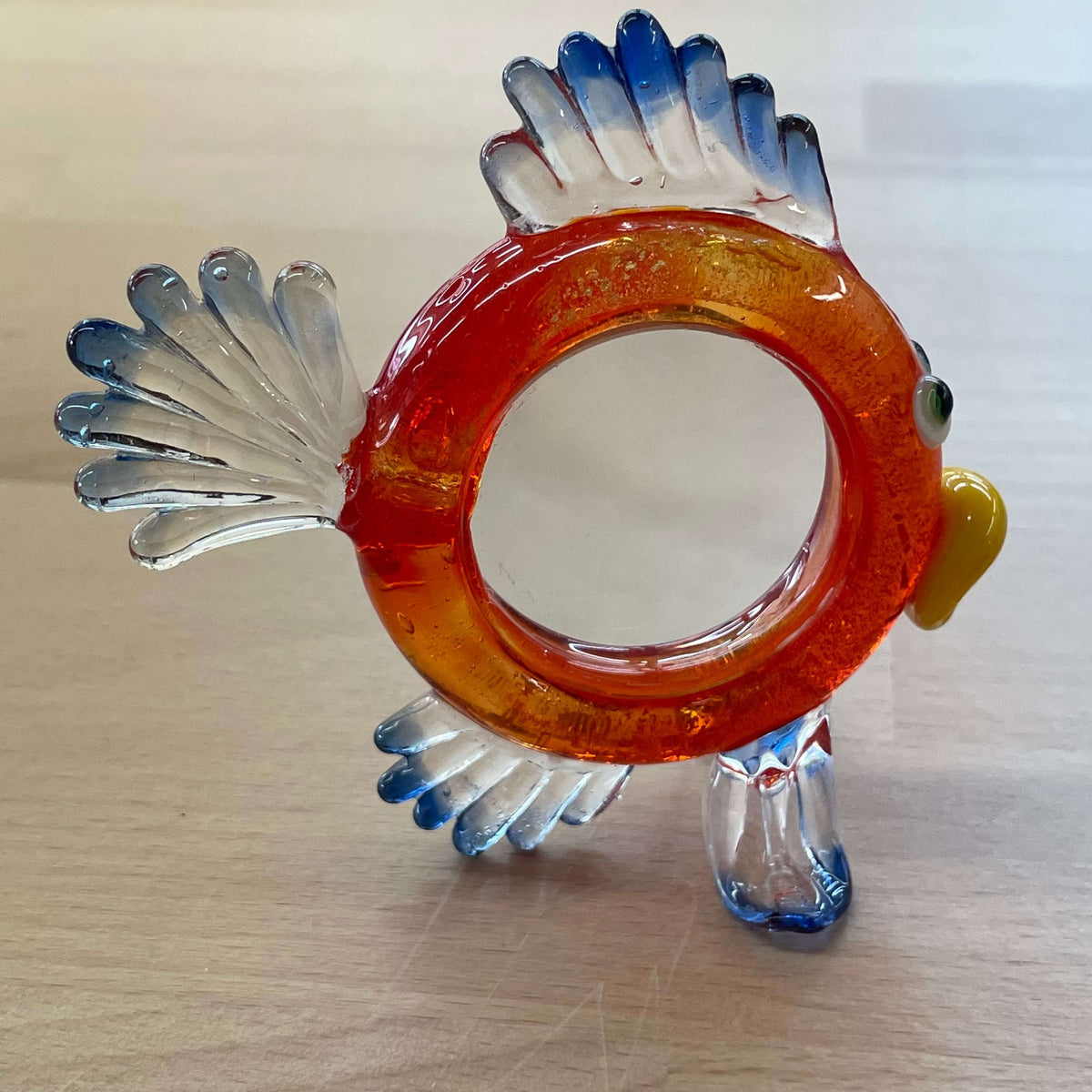 Art glass fish magnifier — side view showing the magnifying lens