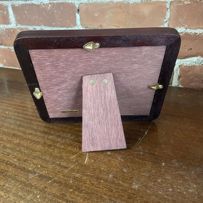 Three-opening wood frame back with easel stand