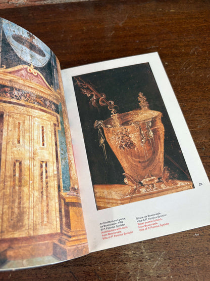 La Pittura Pompeiana book open to a fresco of an urn