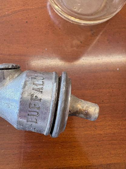 Fillmore Bottling Co. bottle — metal tap head, top view