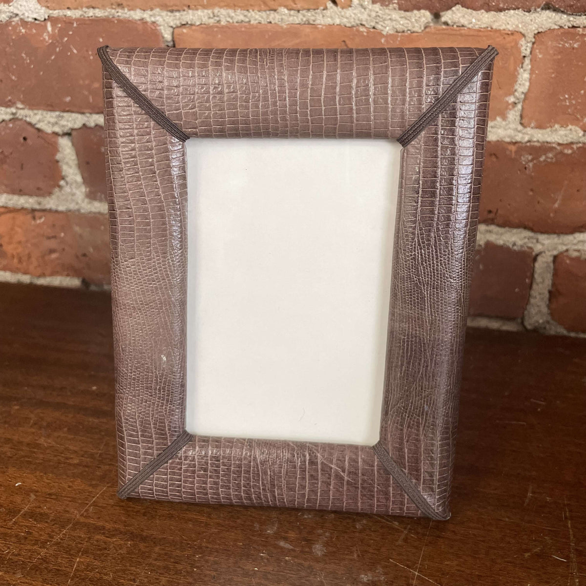 Brown snakeskin-print picture frame, front