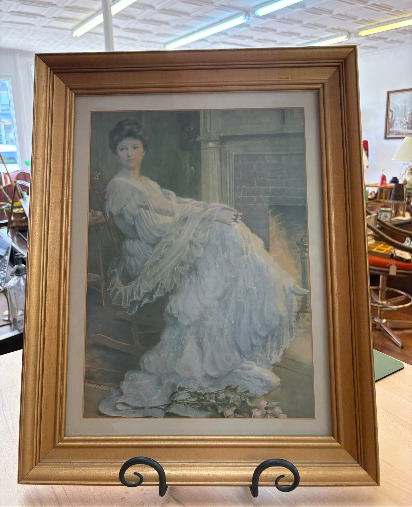 Edwardian Lady by the Hearth – Framed Print in Gilt Wood, 19″ × 15″