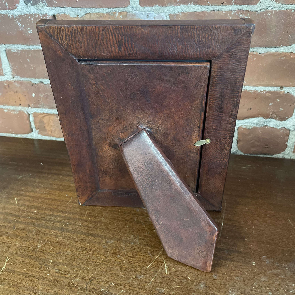 Embellished leather frame back with easel stand