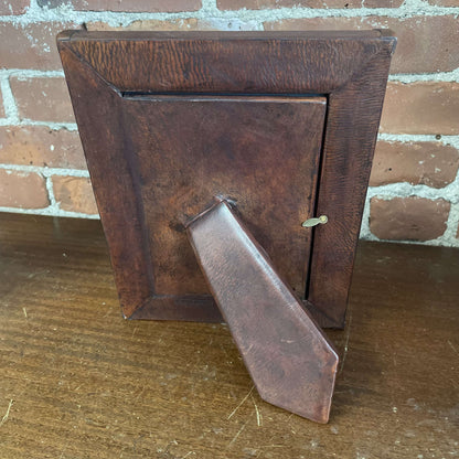 Embellished leather frame back with easel stand