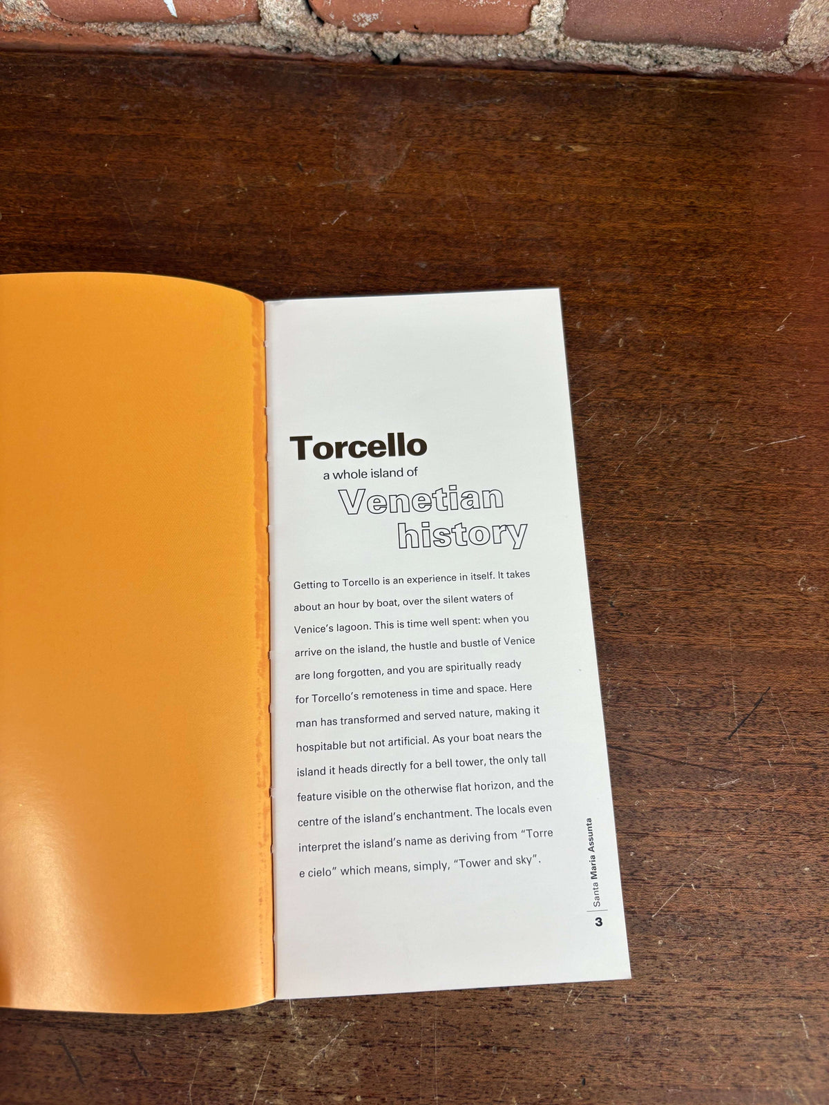 Torcello basilica guidebook open to text pages