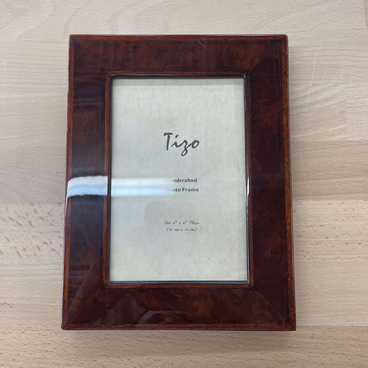 Tizo tortoiseshell lacquer picture frame, 4x6, front view with the Tizo Handcrafted label