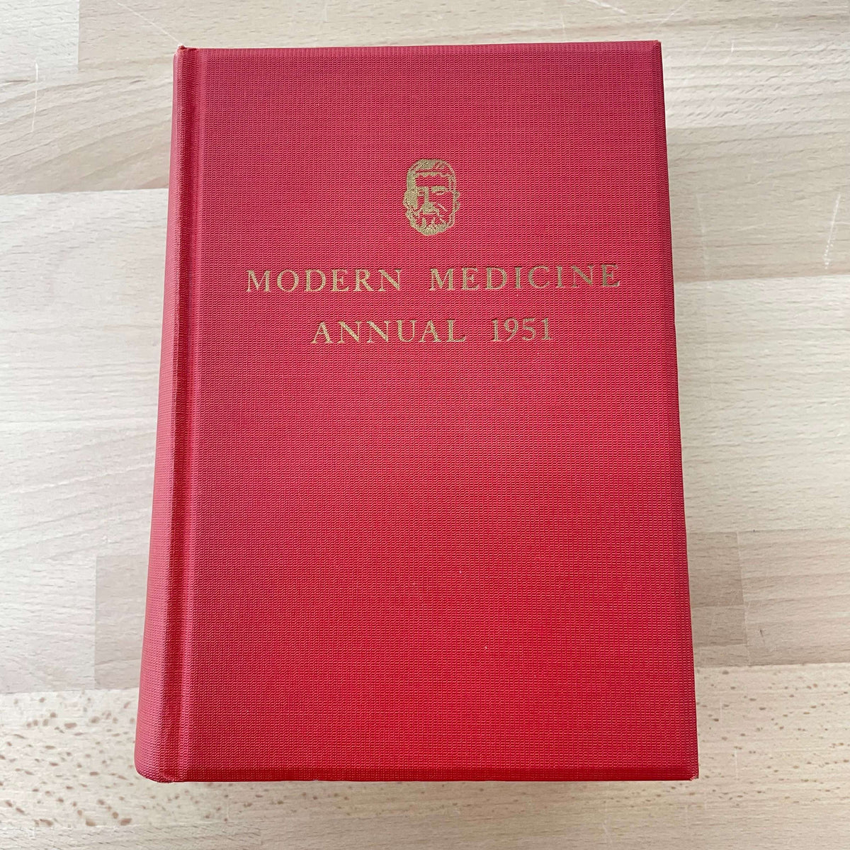 Modern Medicine Annual 1951 — red cloth hardcover with gilt cover emblem