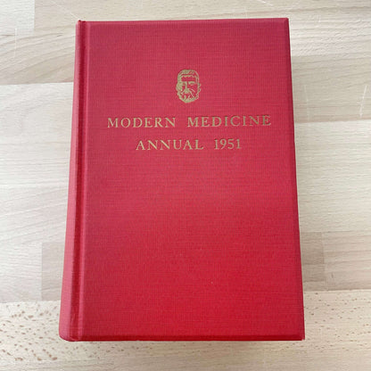 Modern Medicine Annual 1951 — red cloth hardcover with gilt cover emblem