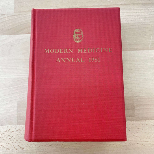 Modern Medicine Annual 1951 — red cloth hardcover with gilt cover emblem