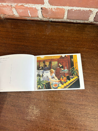 Edward Hopper book open showing a Hopper painting