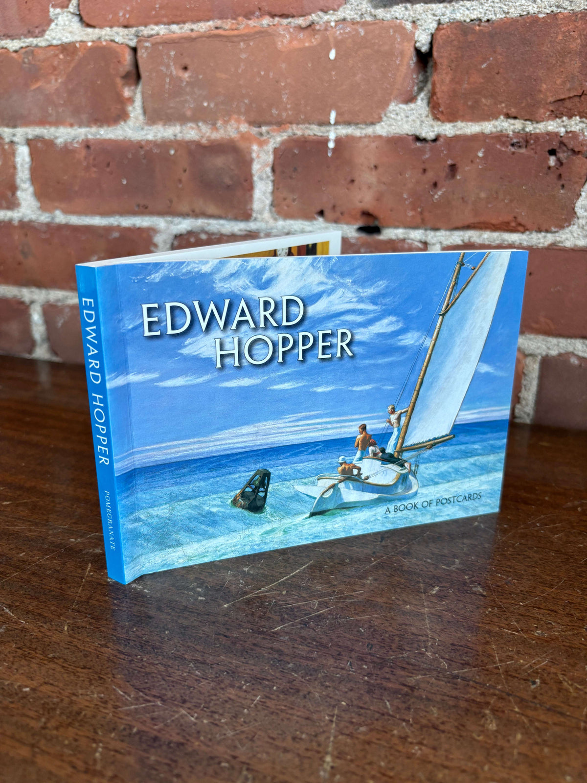 Edward Hopper children's art book cover with a sailboat painting