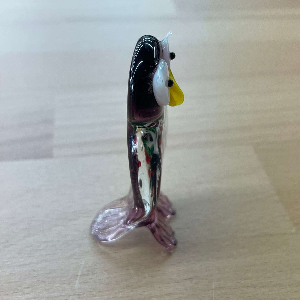 Purple art glass owl figurine — tall rear-side view