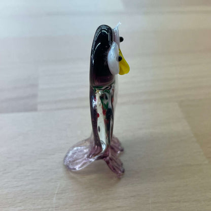 Purple art glass owl figurine — tall rear-side view