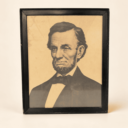 Antique Abraham Lincoln portrait print in black wood frame, front view, photo 1 of 5