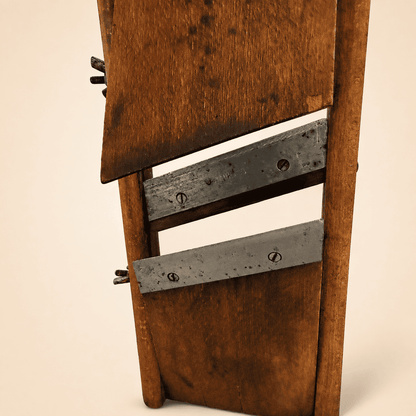 Close view of the stainless blade edges on the wooden board