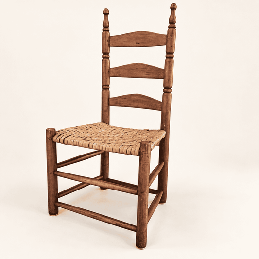 Antique ladder-back side chair with hand-woven splint seat and turned posts