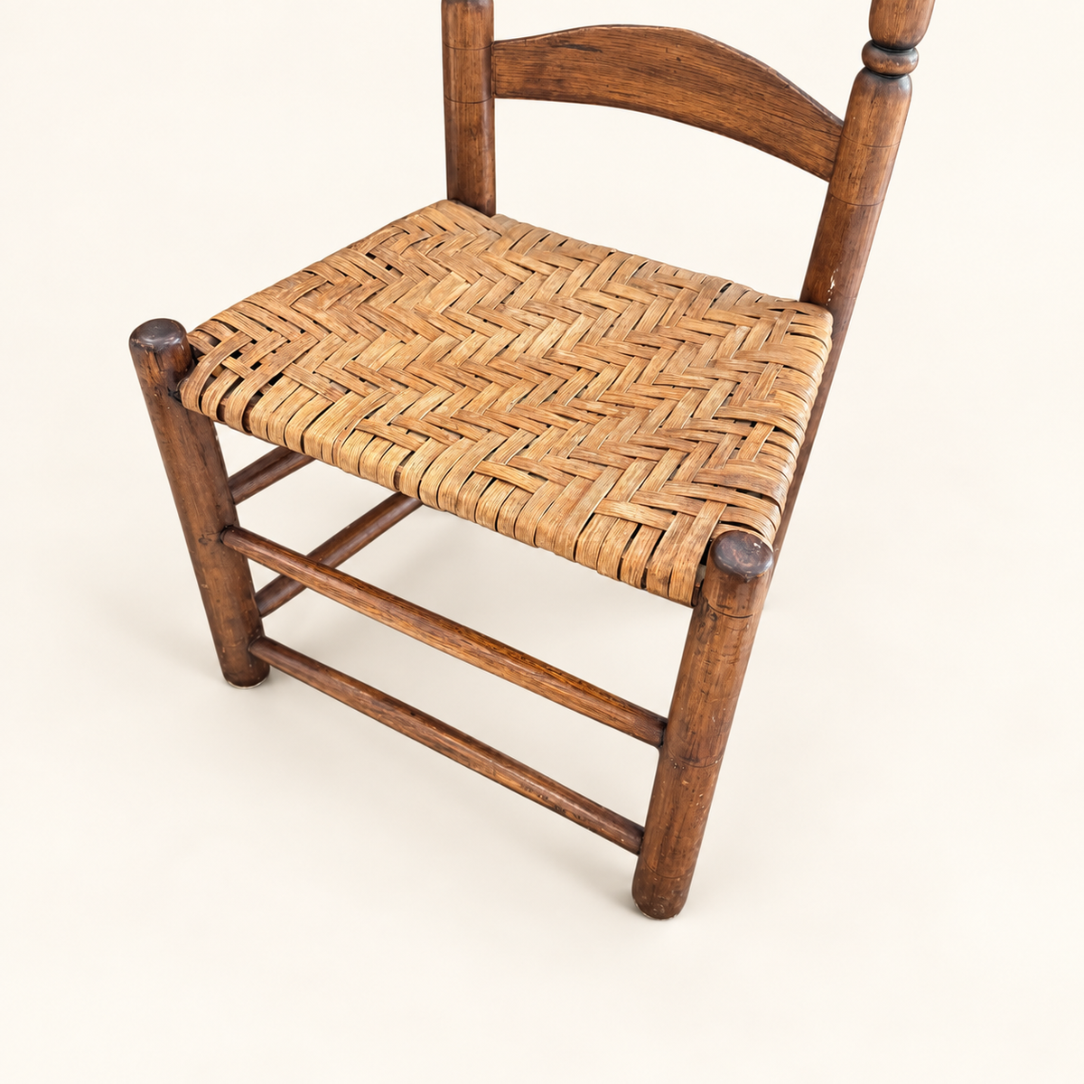 Hand-woven honey splint seat on antique ladder-back chair
