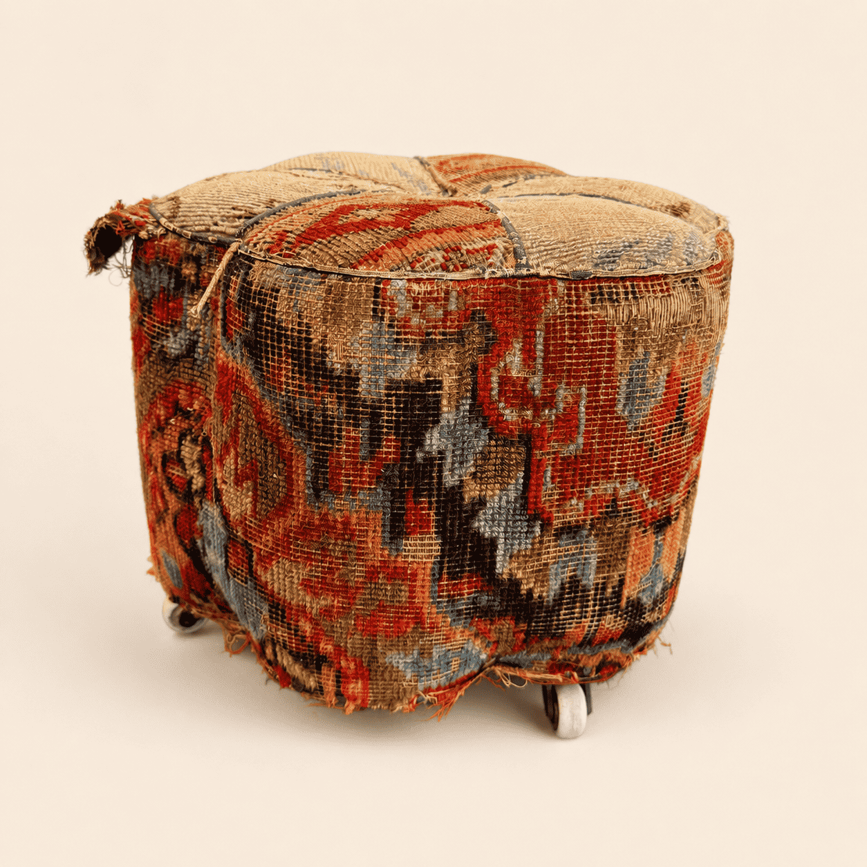 Antique Oriental carpet footstool, side view