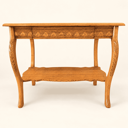 Antique quartersawn oak library table with carved apron, cabriole legs and lower shelf, front view