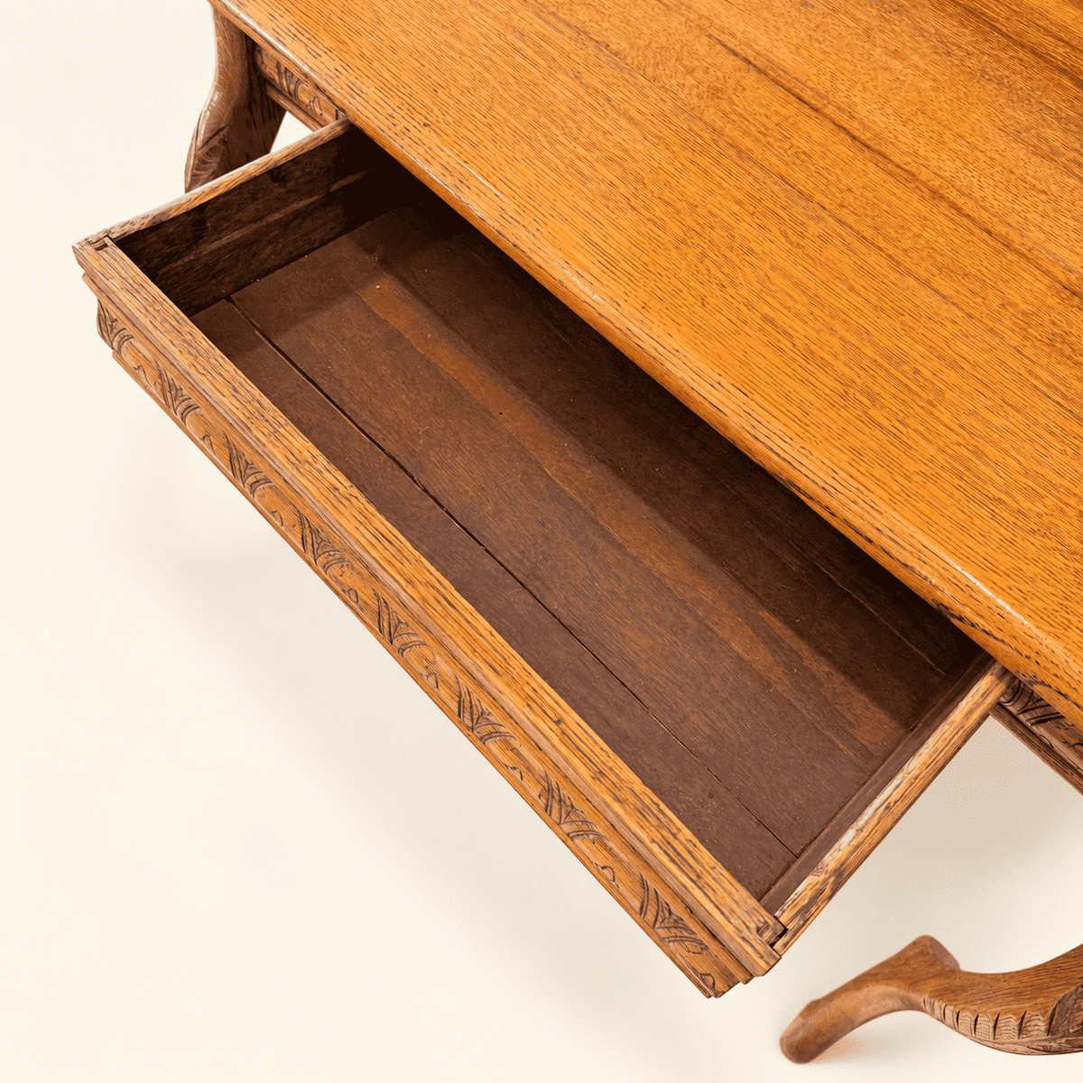Single drawer open with carved front and original wood runners