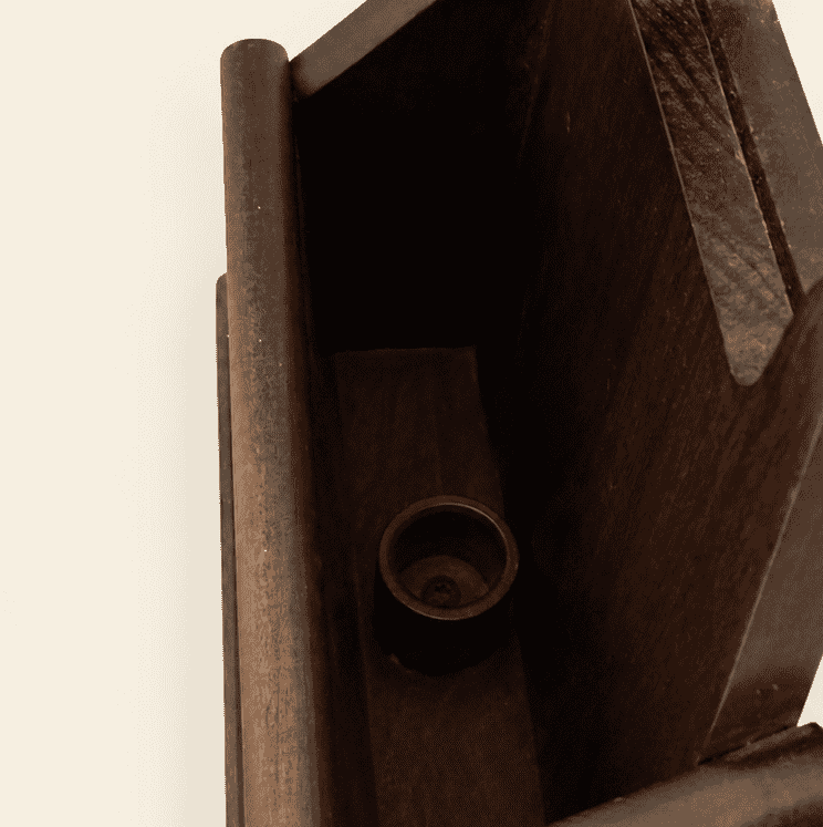 Interior detail of the box shelf below the mirror