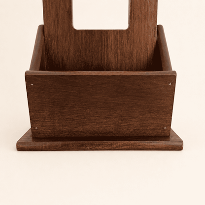 Front of the box shelf at the base of the wall mirror