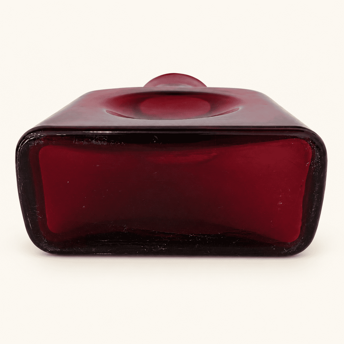 Unmarked base of the vintage Blenko 384 ruby water bottle