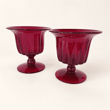 Pair of Blenko ruby ribbed footed compotes, front view