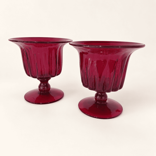 Pair of Blenko ruby ribbed footed compotes, front view