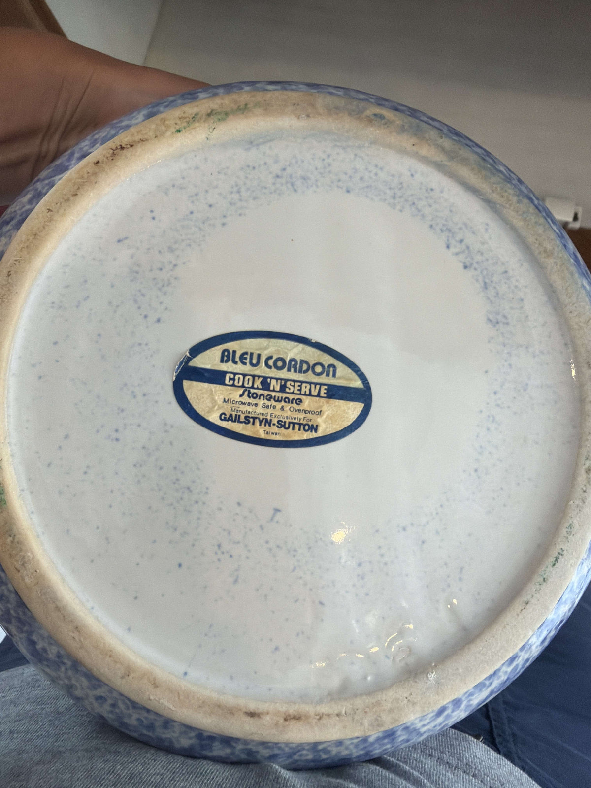 Blue sponged stoneware casserole showing the domed lid and lug handles