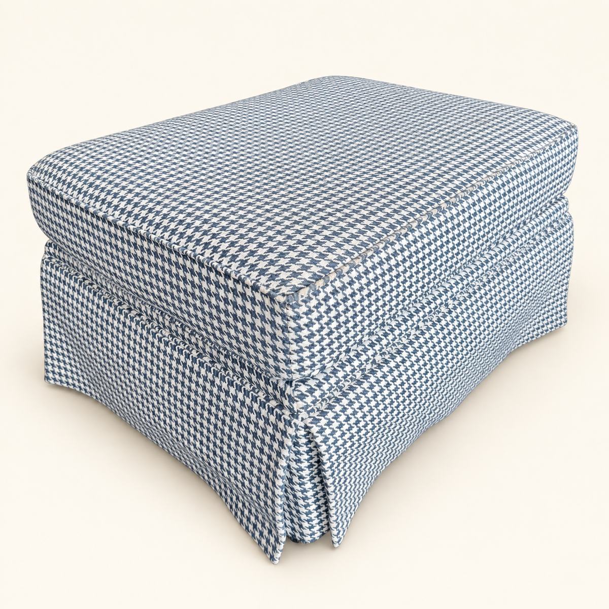 Upholstered houndstooth footstool with tailored skirt