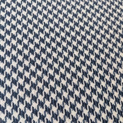 Houndstooth upholstered ottoman side profile