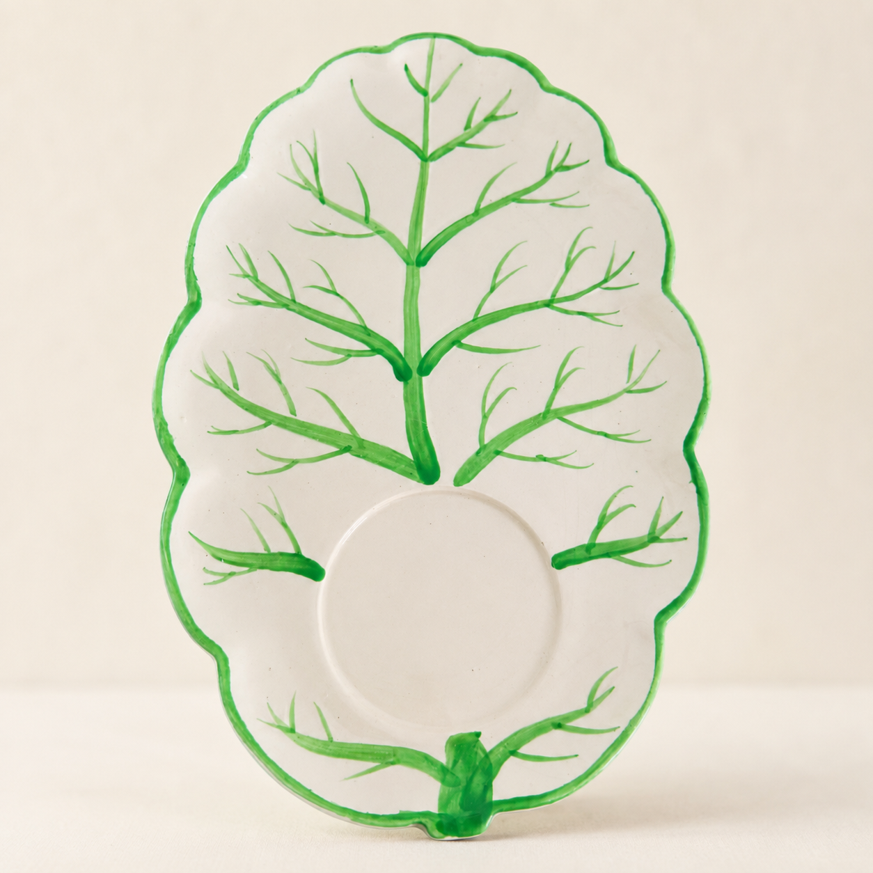 Hand-painted cabbage-leaf snack plate with green veining