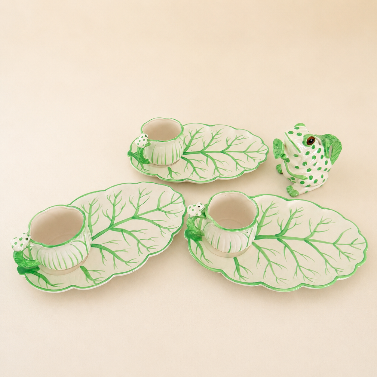 Café Italiano frog and cabbage-leaf set with plates, cups, and creamer