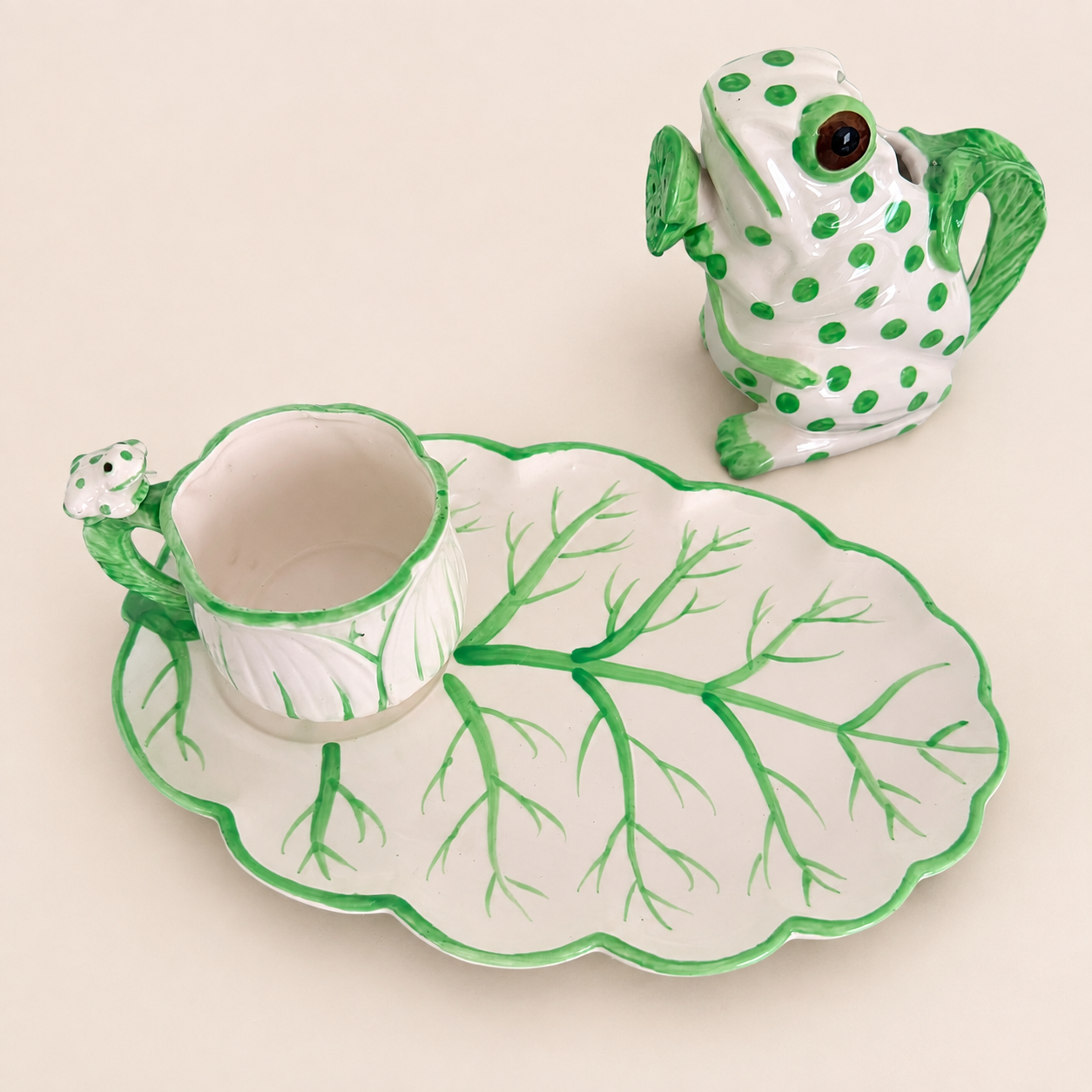Cabbage-leaf plate with matching cup and frog creamer