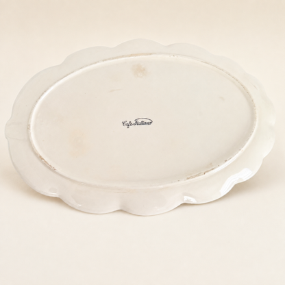 Underside of leaf plate showing "Café Italiano" mark