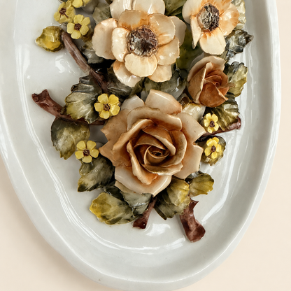 Detail of applied ceramic rose on Capodimonte-style plaque