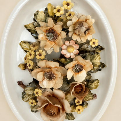 Detail of applied ceramic rose on Capodimonte-style plaque