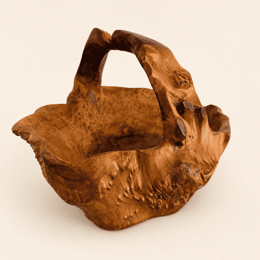 Carved rootwood basket with sculptural handle and live-edge burl, front view