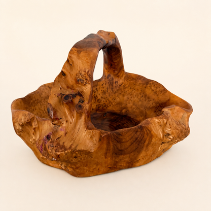 Three-quarter view of live-edge carved root basket