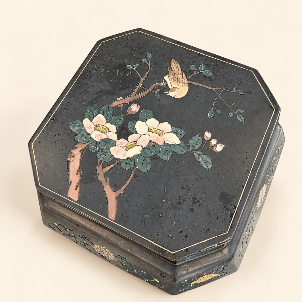 Hand-painted floral spray on black lacquer stool top