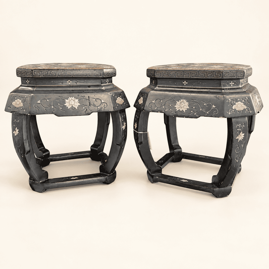 Pair of Chinese black lacquered hexagonal stools with painted florals