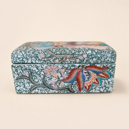 Side of Chinese porcelain box with lotus and branch design