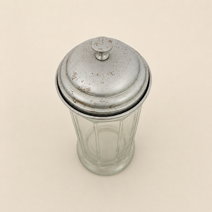 Close-up of the tarnished domed lid and knob