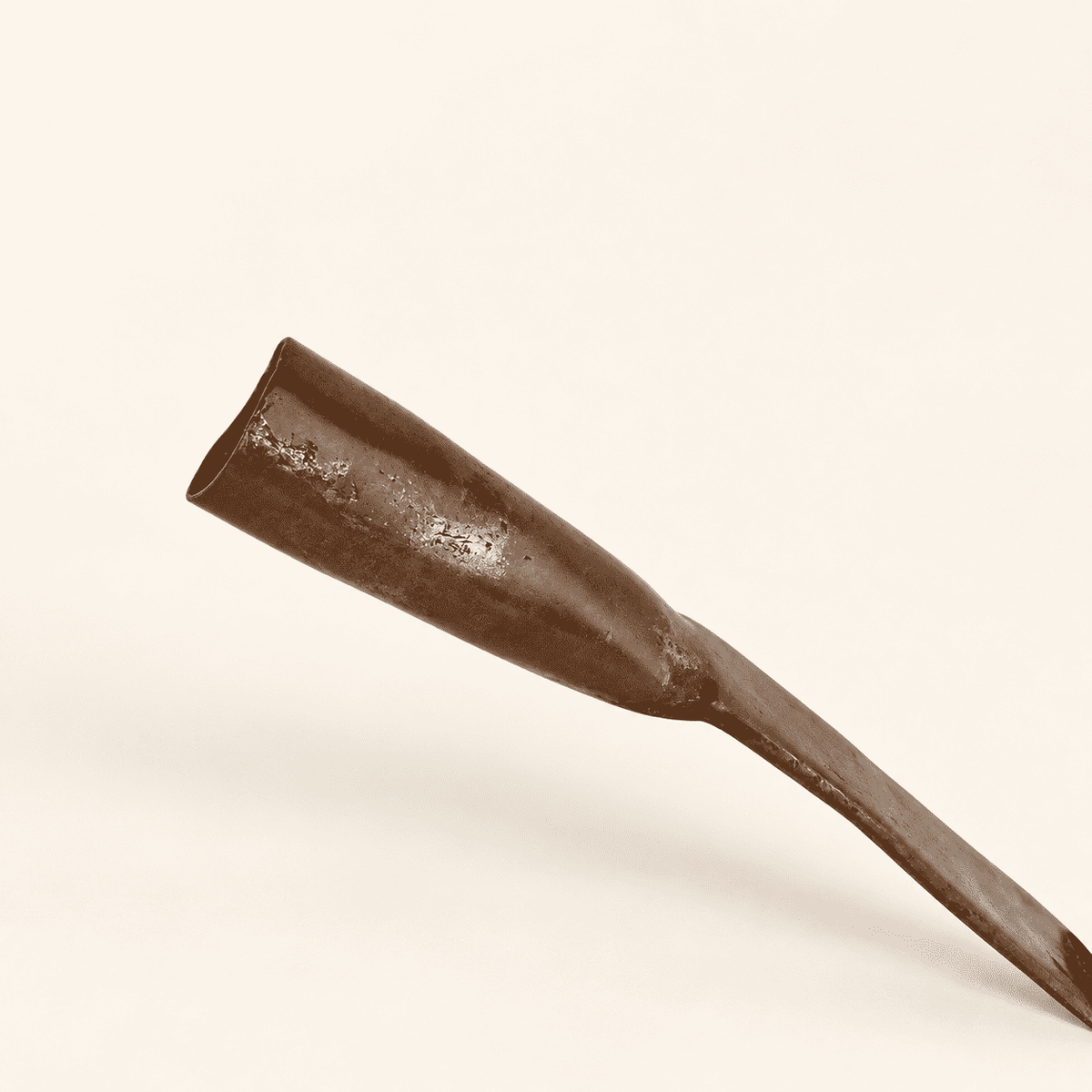 Close view of the open rolled socket at the end of the dipper handle