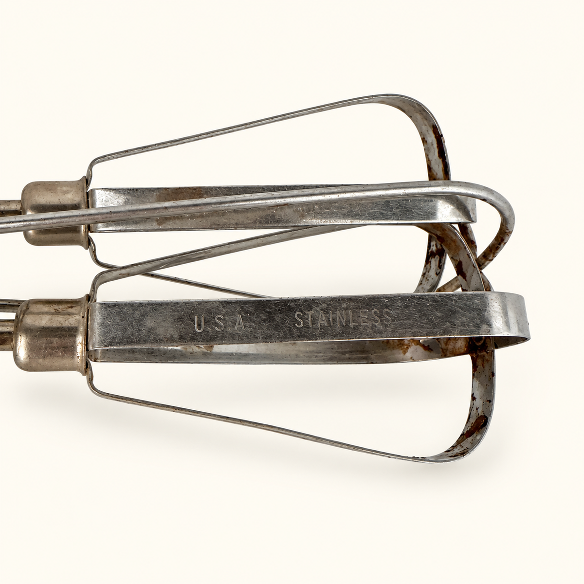 Beater blade stamped U.S.A. Stainless, close detail