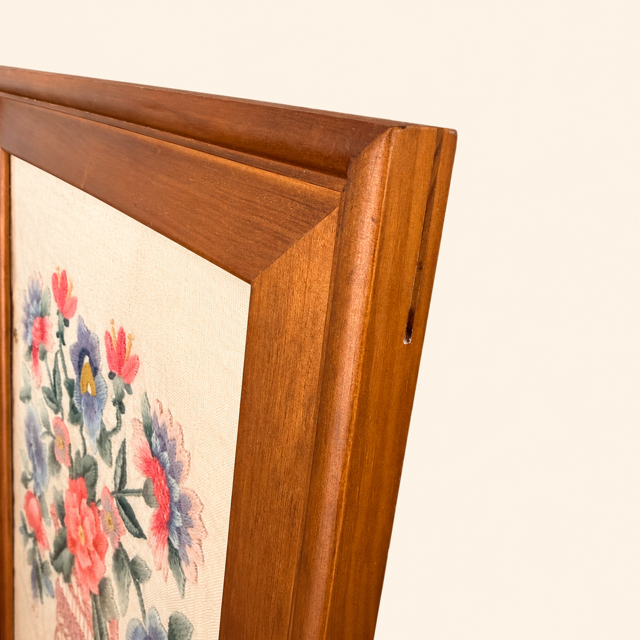 Detail of wood frame corner with walnut finish
