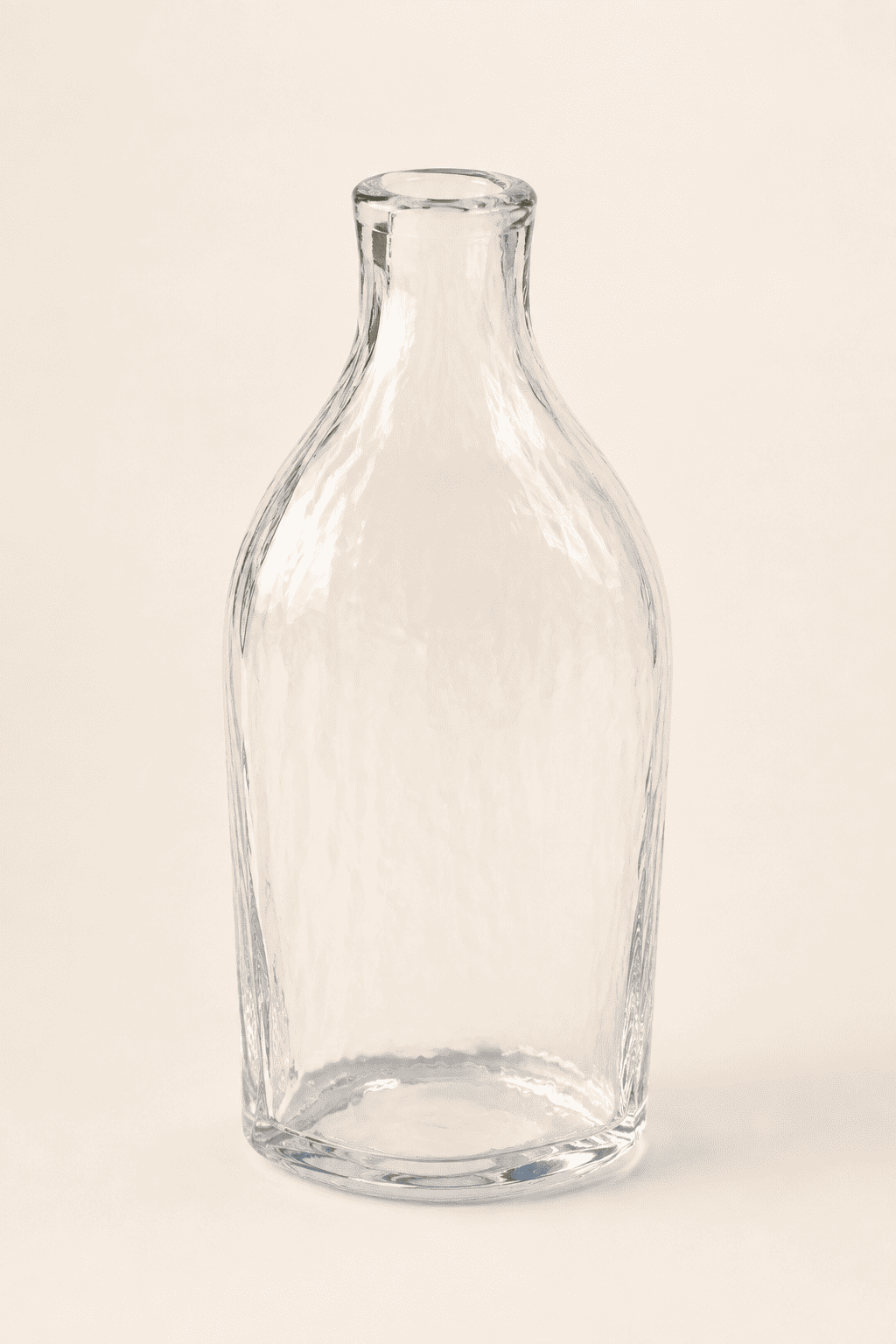 Vintage clear glass bottle bud vase with wavy ripple texture, main view — Loom Vintage