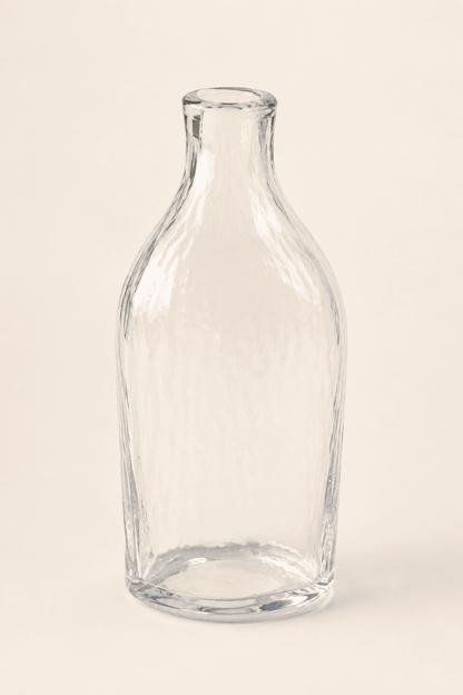 Vintage clear glass bottle bud vase with wavy ripple texture, main view — Loom Vintage